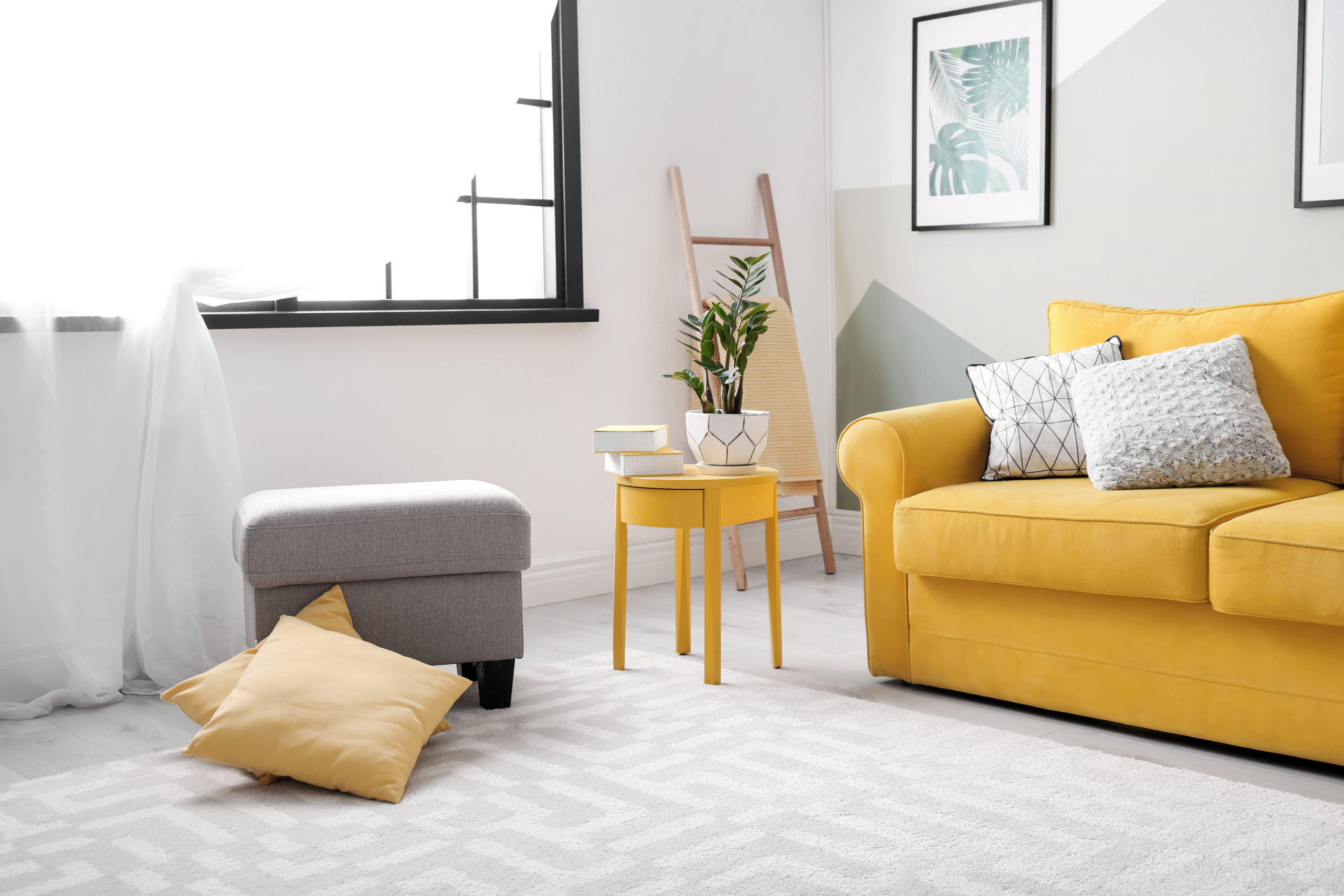 Living Room With Pale Yellow Sofa